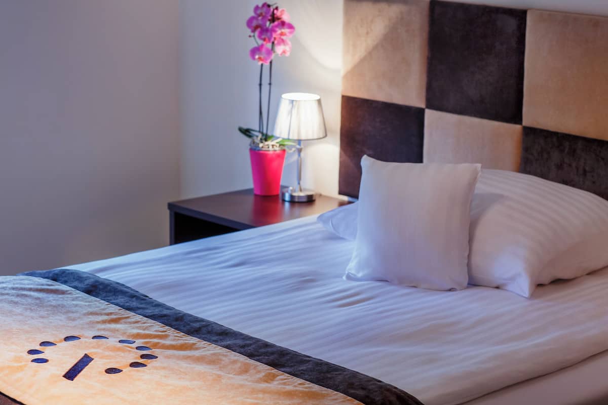 Standard Triple Room | Desk, blackout drapes, iron/ironing board, free WiFi