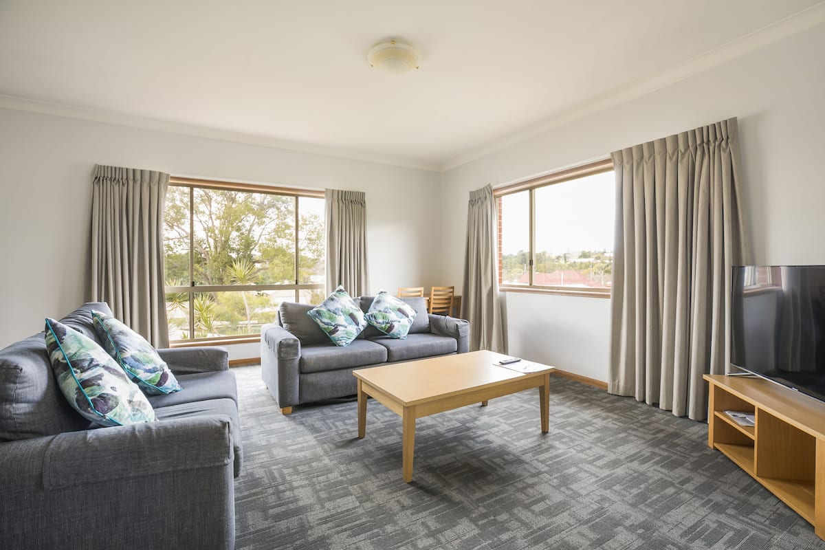 three bedroom apartment | living room | tv