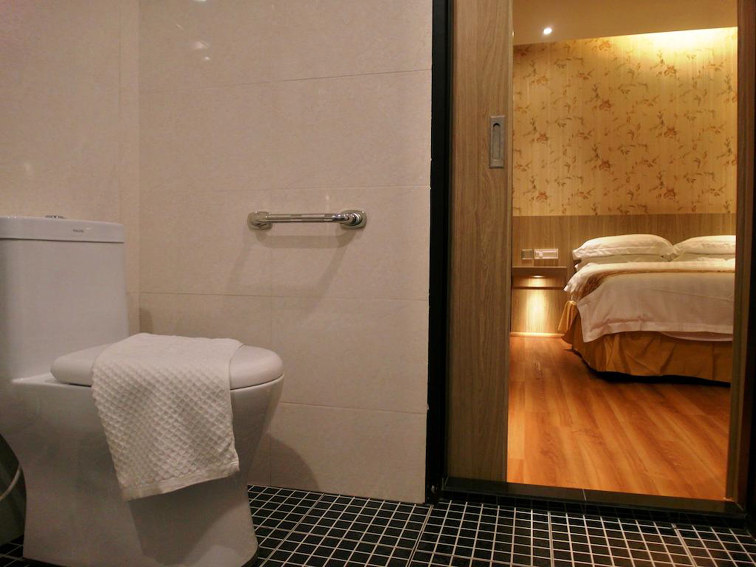 standard queen room with window (includes hotel to airport transfer) | bathroom | shower, hair dryer, slippers, bidet