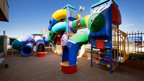A playground with various slides and climbing structures. - Wilsonton Hotel (Wilsonton)