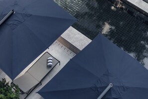 Outdoor pool, open 8:00 AM to 8:00 PM, pool umbrellas, sun loungers