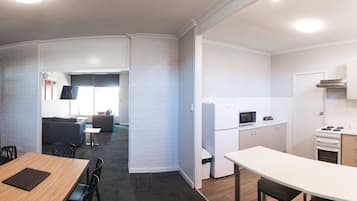 Standard Apartment, 3 Bedrooms | Private kitchen | Fridge, coffee/tea maker, electric kettle