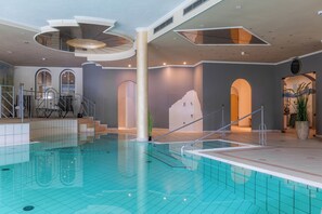 Indoor pool, open 8:00 AM to 9:30 PM, pool umbrellas, sun loungers