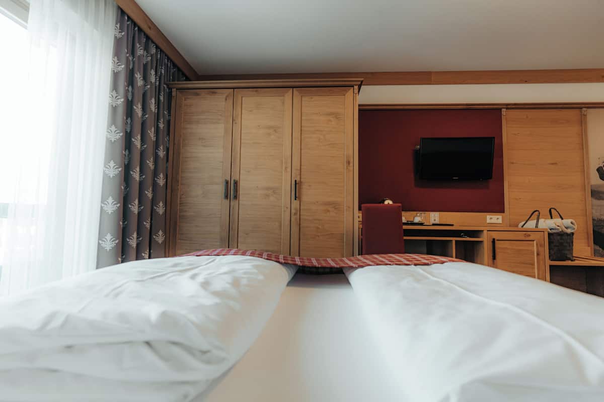Habitación doble superior | Minibar y caja de seguridad en la habitación