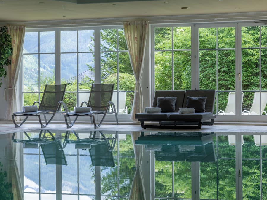 Indoor pool, open 8:00 AM to 9:30 PM, pool umbrellas, sun loungers