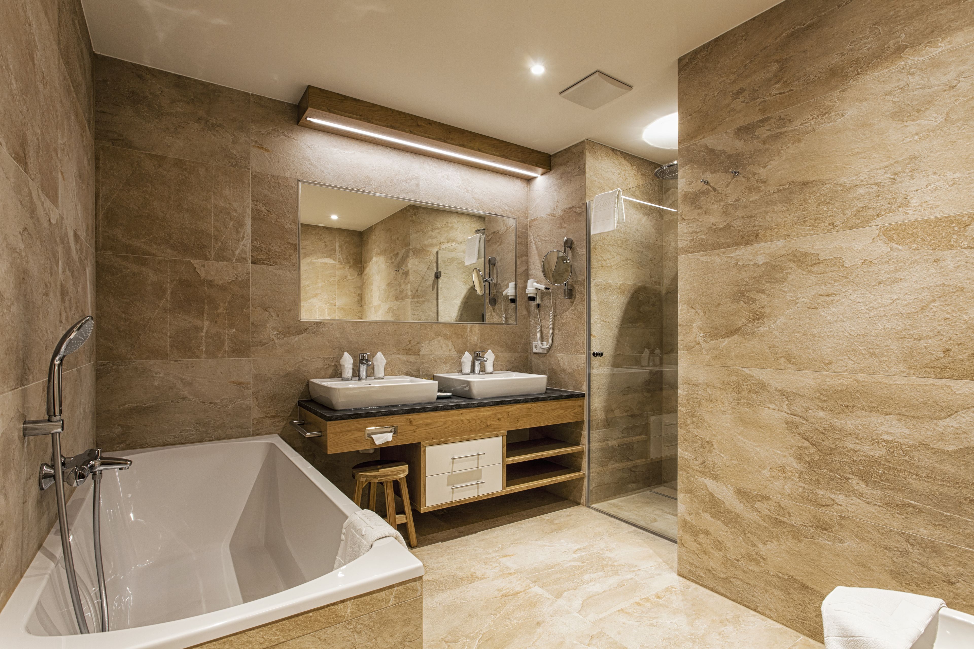 family studio, balcony, mountain view (wohnstudio deluxe) | bathroom | hair dryer, bathrobes, slippers, towels