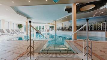 Indoor pool, open 8:00 AM to 8:00 PM, pool umbrellas, sun loungers