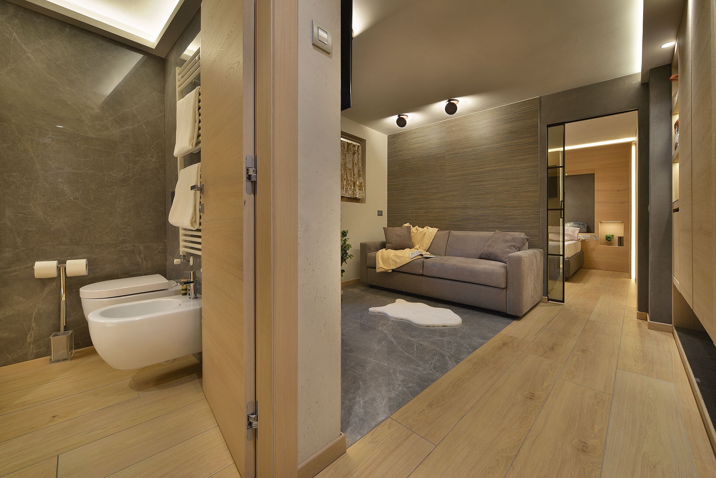 luxury suite, 1 bedroom, sauna | living area | 48-inch flat-screen tv with satellite channels, tv