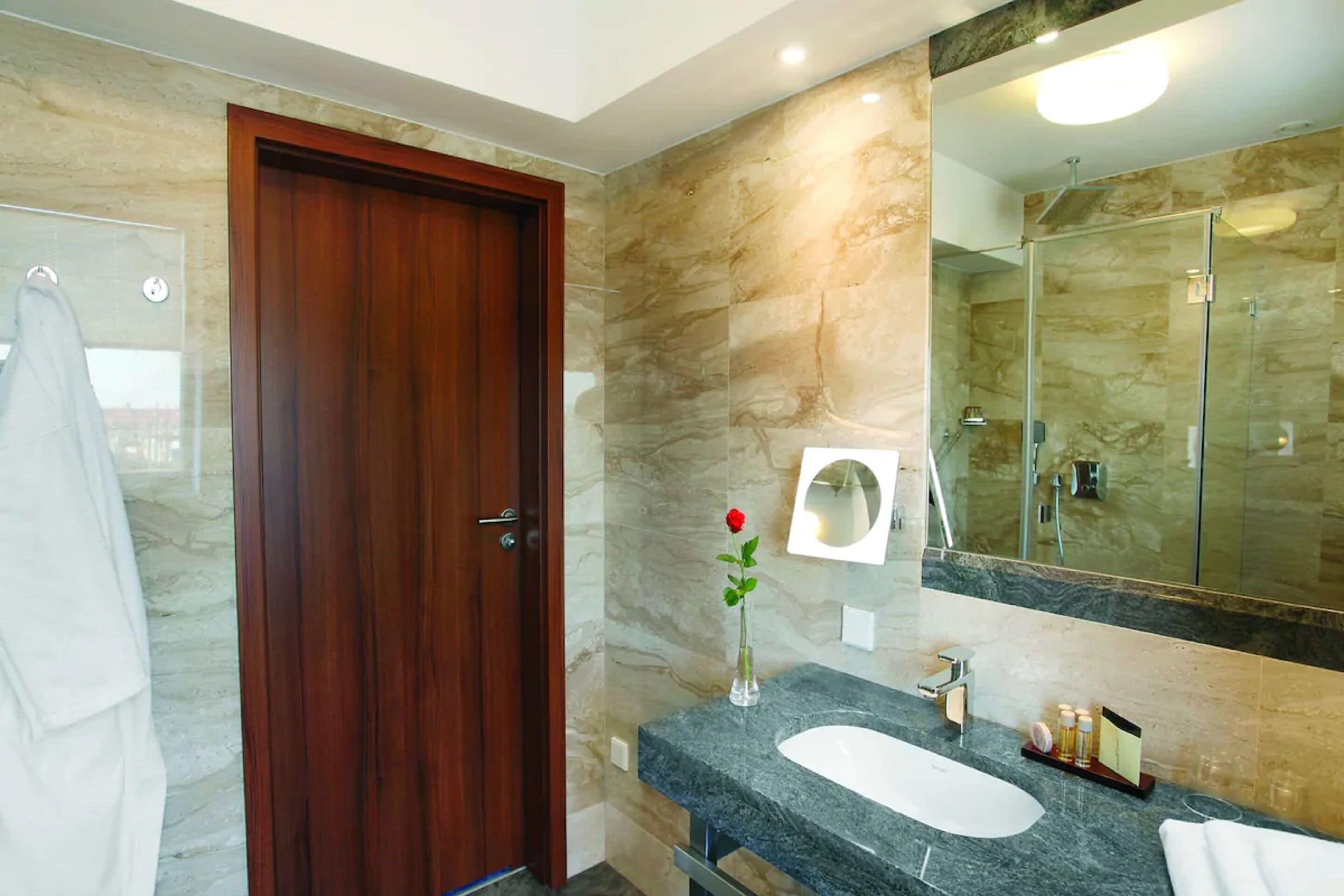 rainfall showerhead, designer toiletries, hair dryer, bathrobes