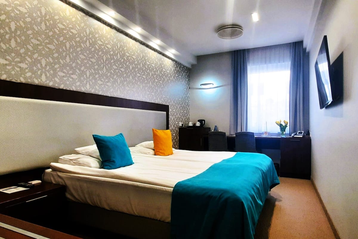 Ropa de cama de alta calidad y minibar