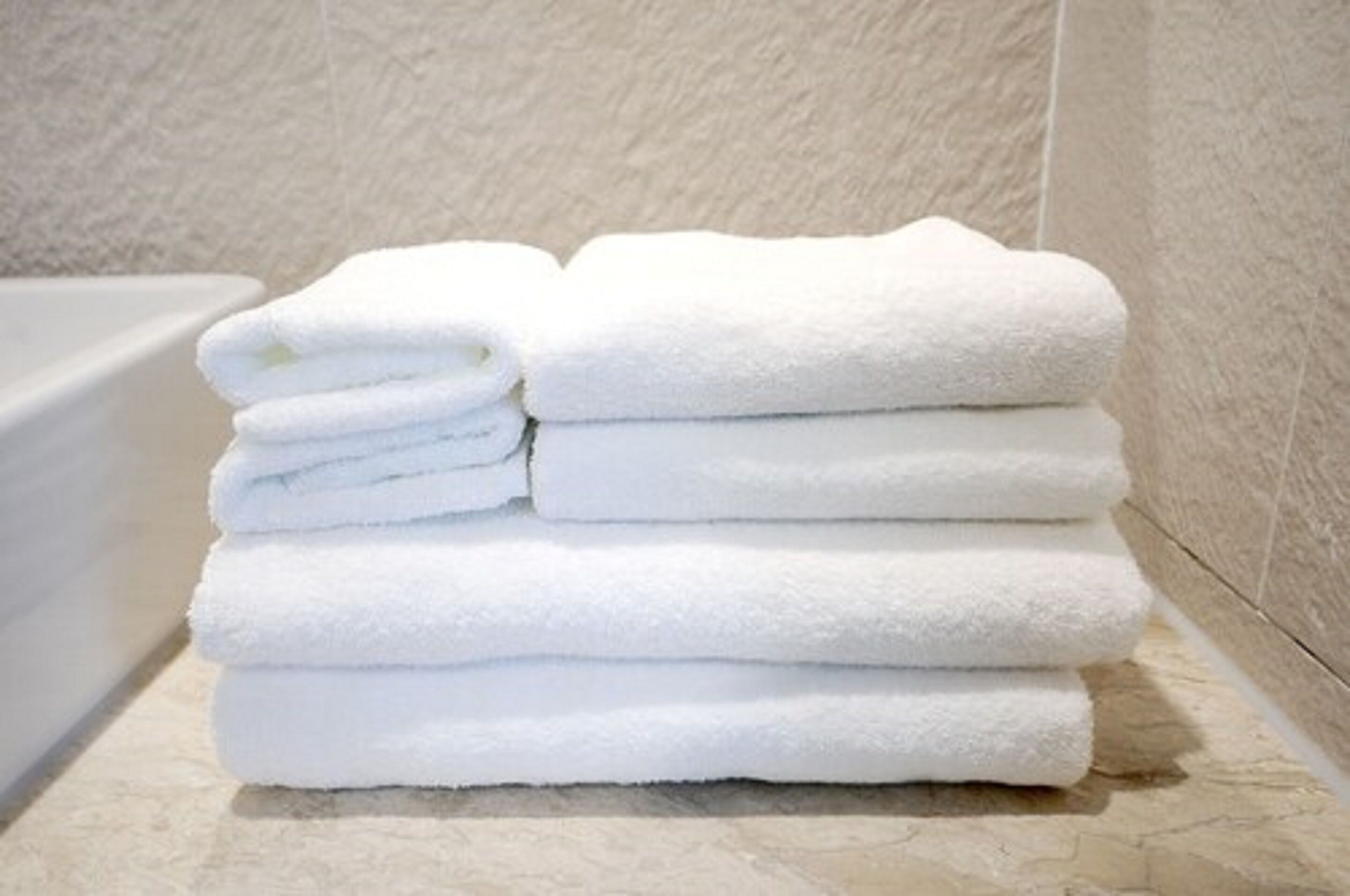 designer toiletries, hair dryer, bathrobes, slippers