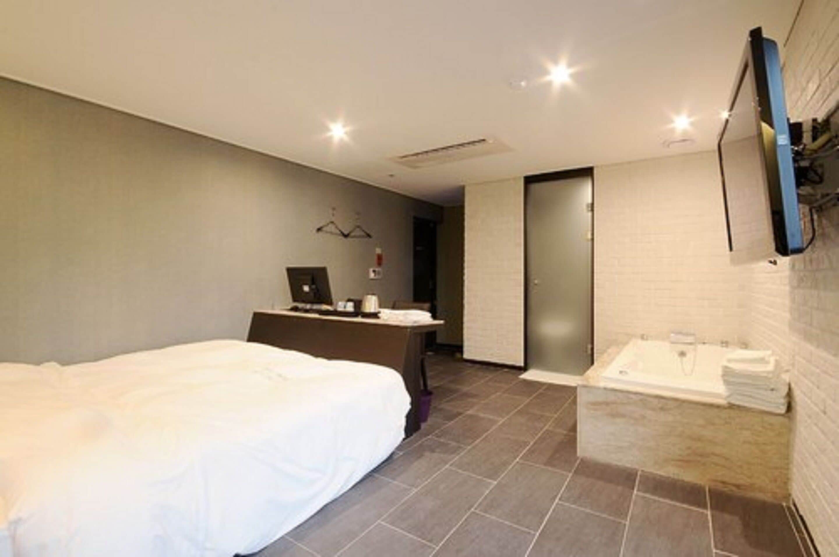 premium bedding, down duvets, minibar, blackout curtains