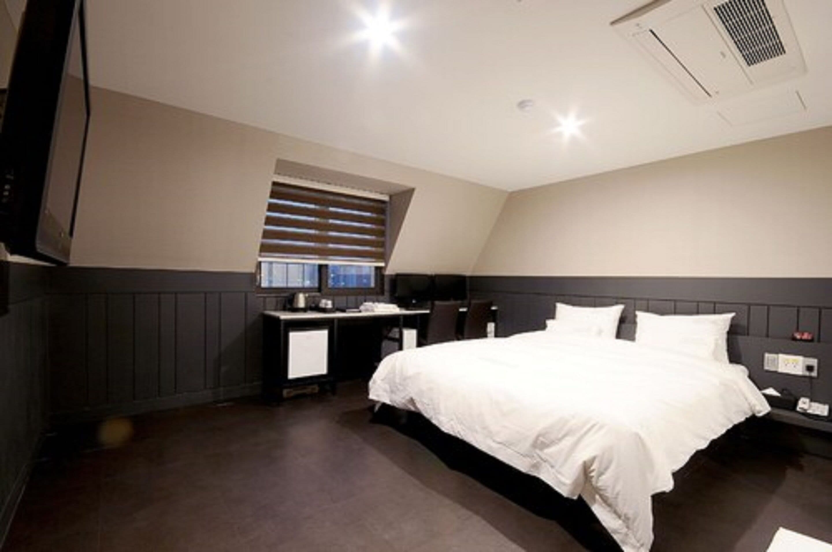 premium bedding, down duvets, minibar, blackout curtains