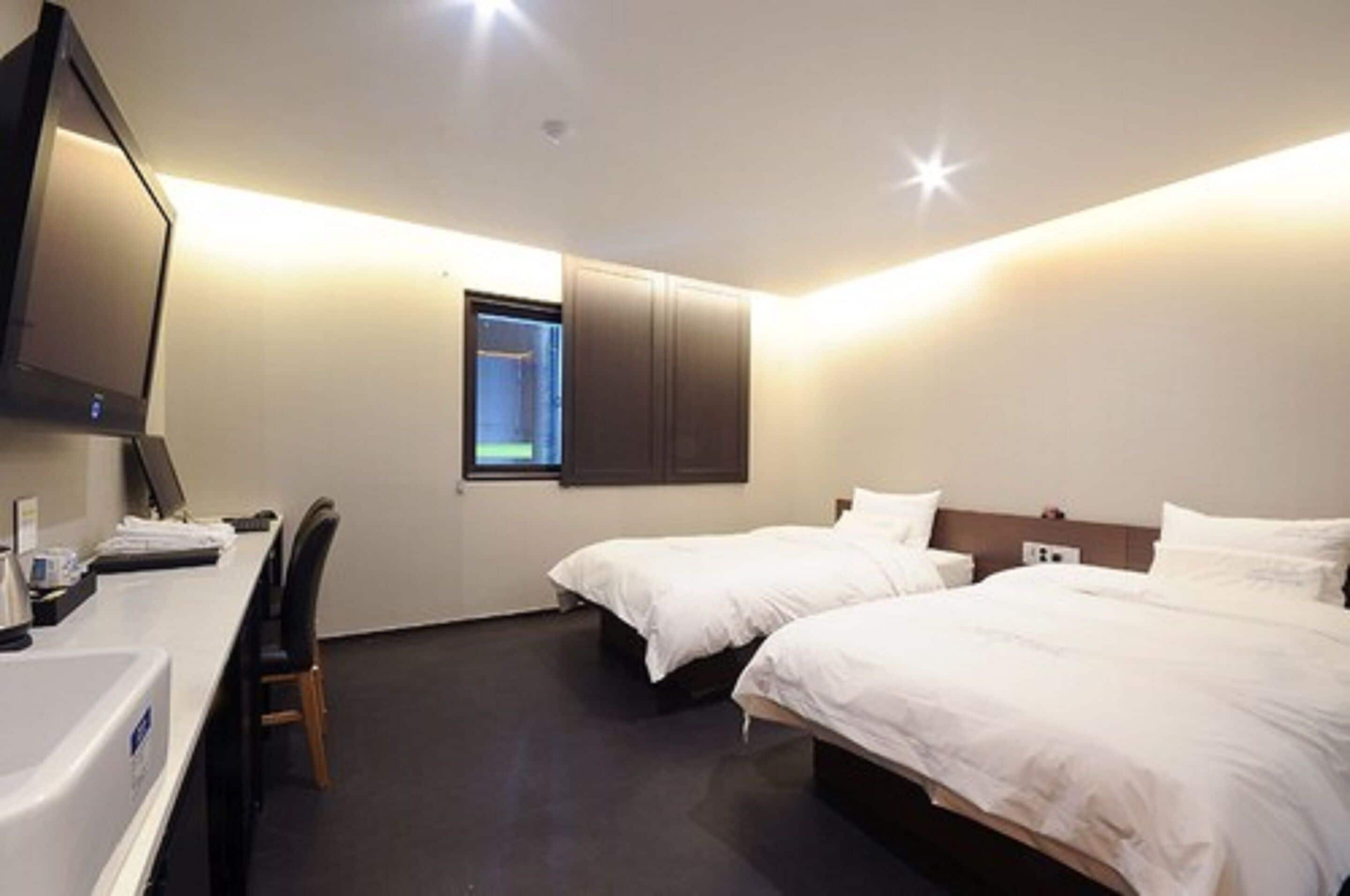 premium bedding, down duvets, minibar, blackout curtains