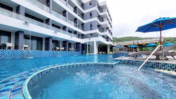 Outdoor pool, open 7 AM to 9:00 PM, pool umbrellas, pool loungers