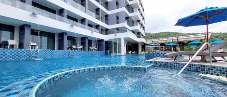Outdoor pool, open 7 AM to 9:00 PM, pool umbrellas, sun loungers