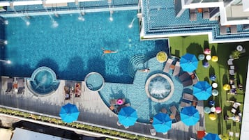 Outdoor pool, open 7 AM to 9:00 PM, pool umbrellas, pool loungers