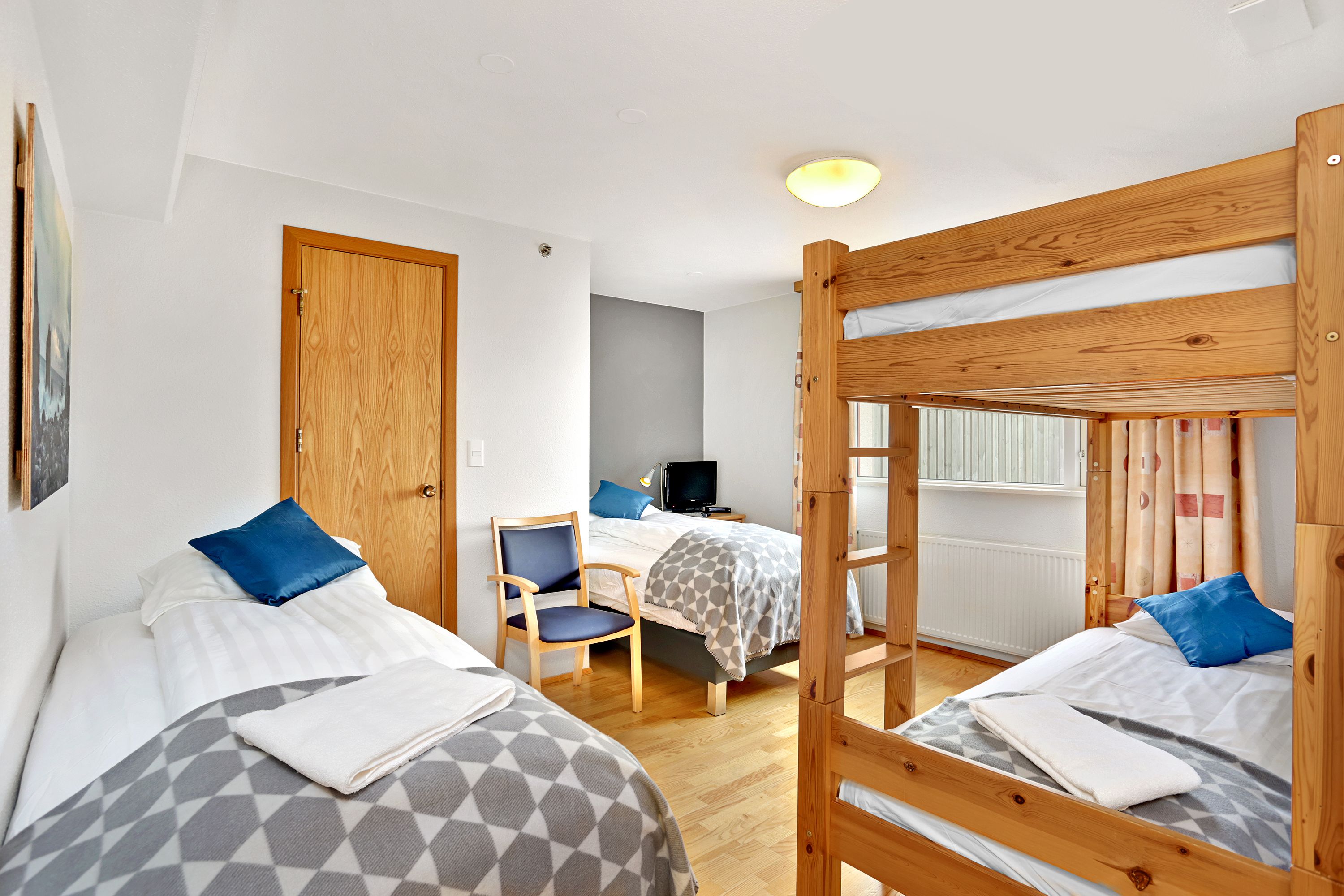 quadruple room | hypo-allergenic bedding, in-room safe, desk, blackout curtains