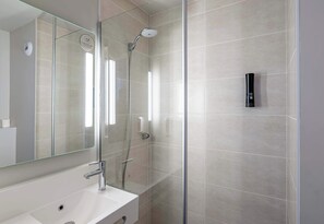 Shower, free toiletries, hair dryer, towels