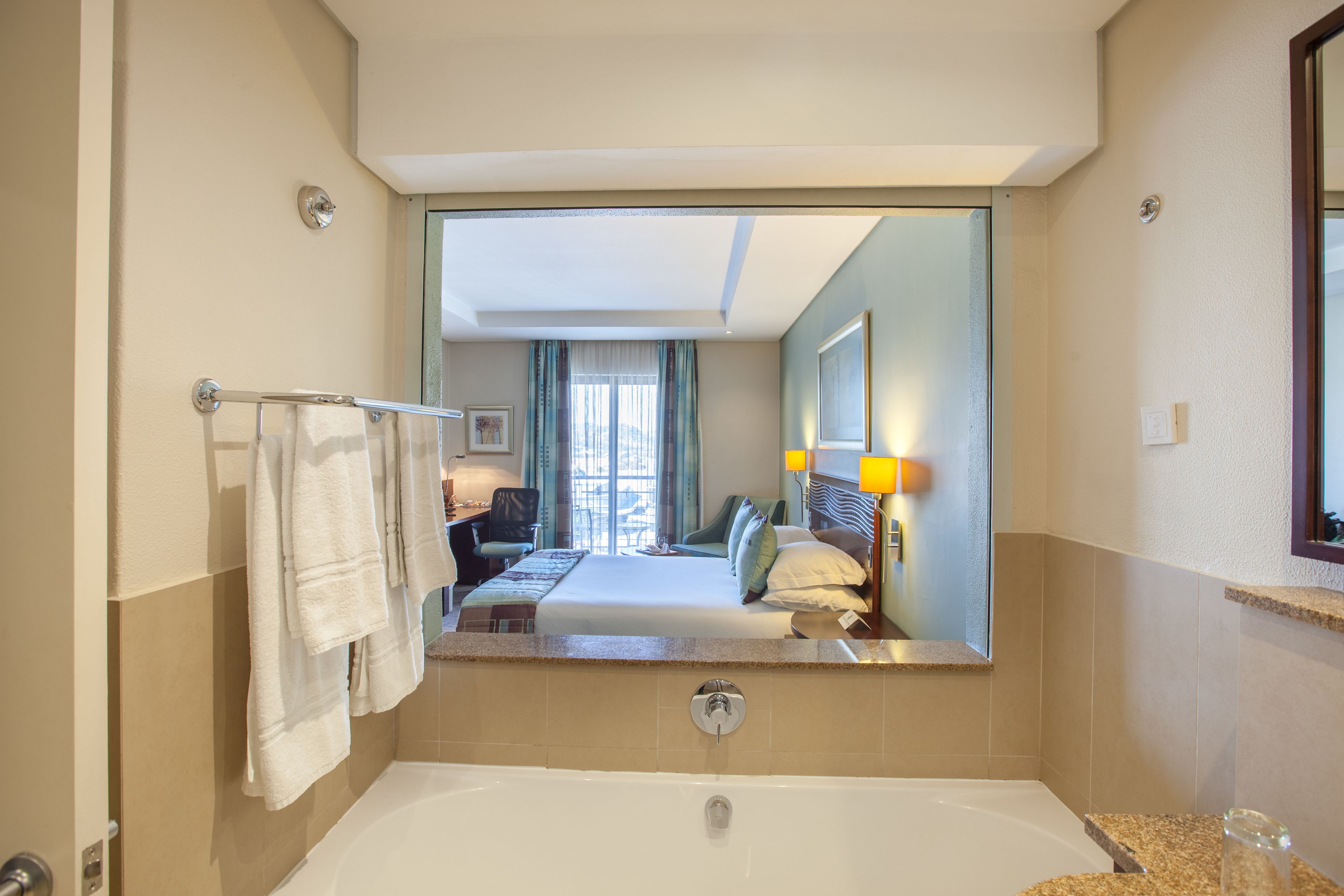 in-room safe, desk, blackout curtains, iron/ironing board