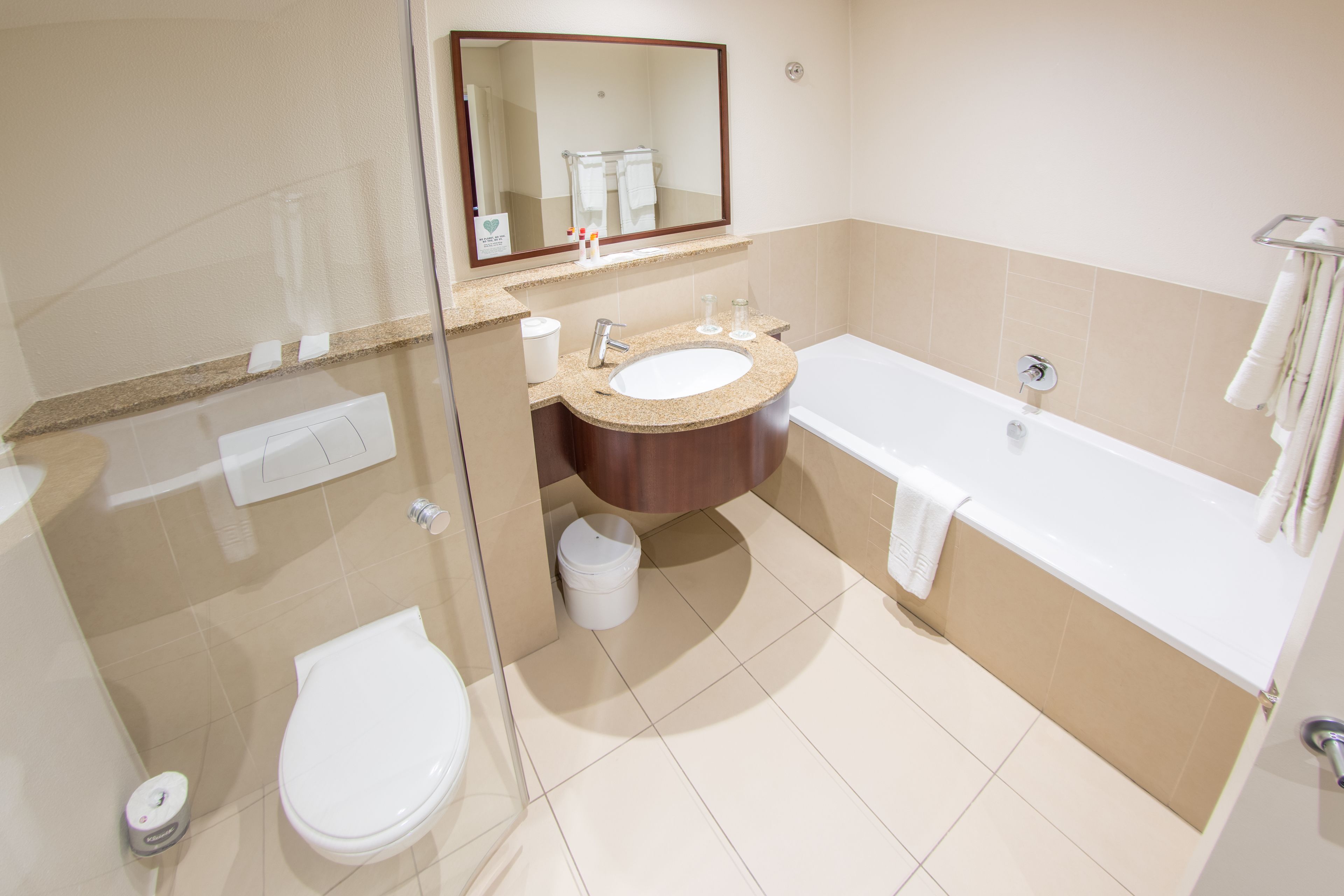 separate bathtub and shower, free toiletries, hair dryer, towels