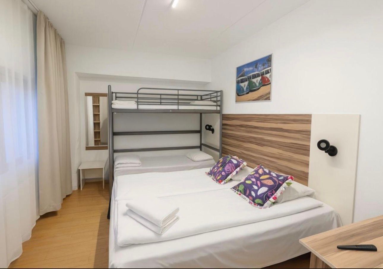 Family Room (Private Bathroom) | Desk, laptop workspace, free WiFi, bed sheets