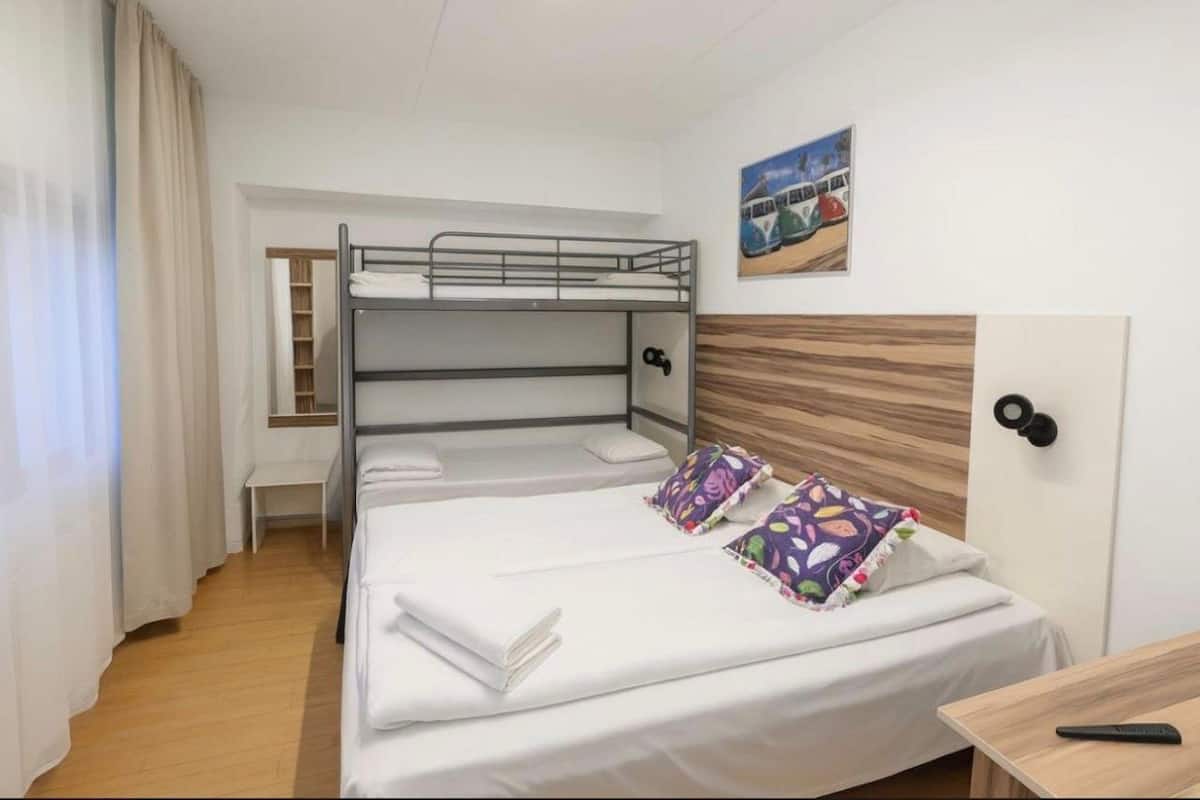 Family Room (Private Bathroom) | Desk, laptop workspace, free WiFi, bed sheets