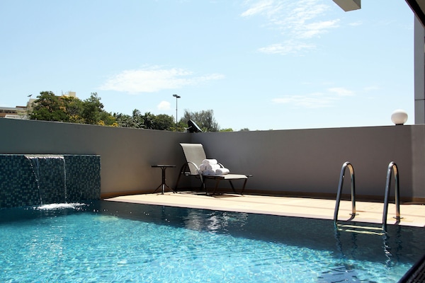Outdoor pool, sun loungers