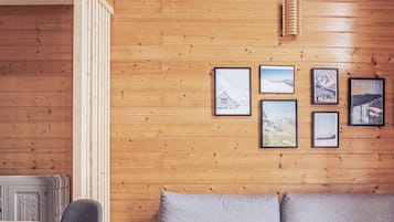 Duplex Apartment (2 Adults) | Living area | 80-cm flat-screen TV with cable channels, TV