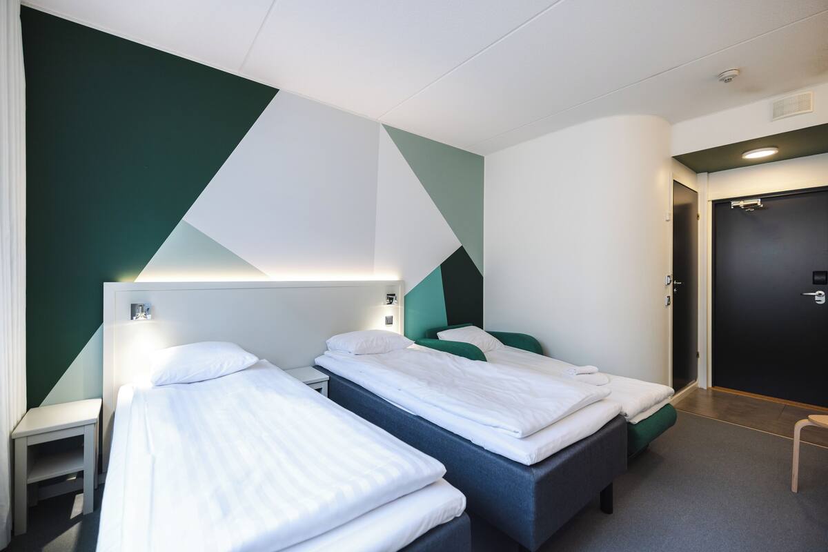 standard room | blackout curtains, iron/ironing board, cots/infant beds, free wifi