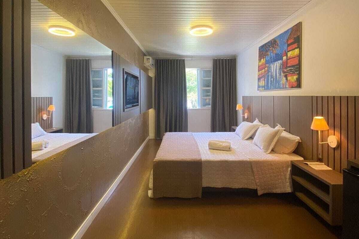 Luxury Double Room, Partial Ocean View | Minibar, in-room safe, bed sheets