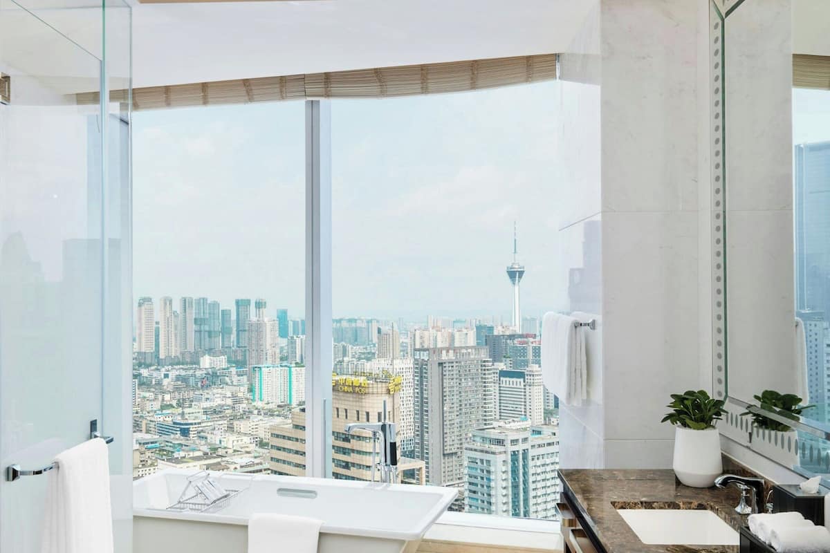 separate bathtub and shower, free toiletries, hair dryer, bathrobes