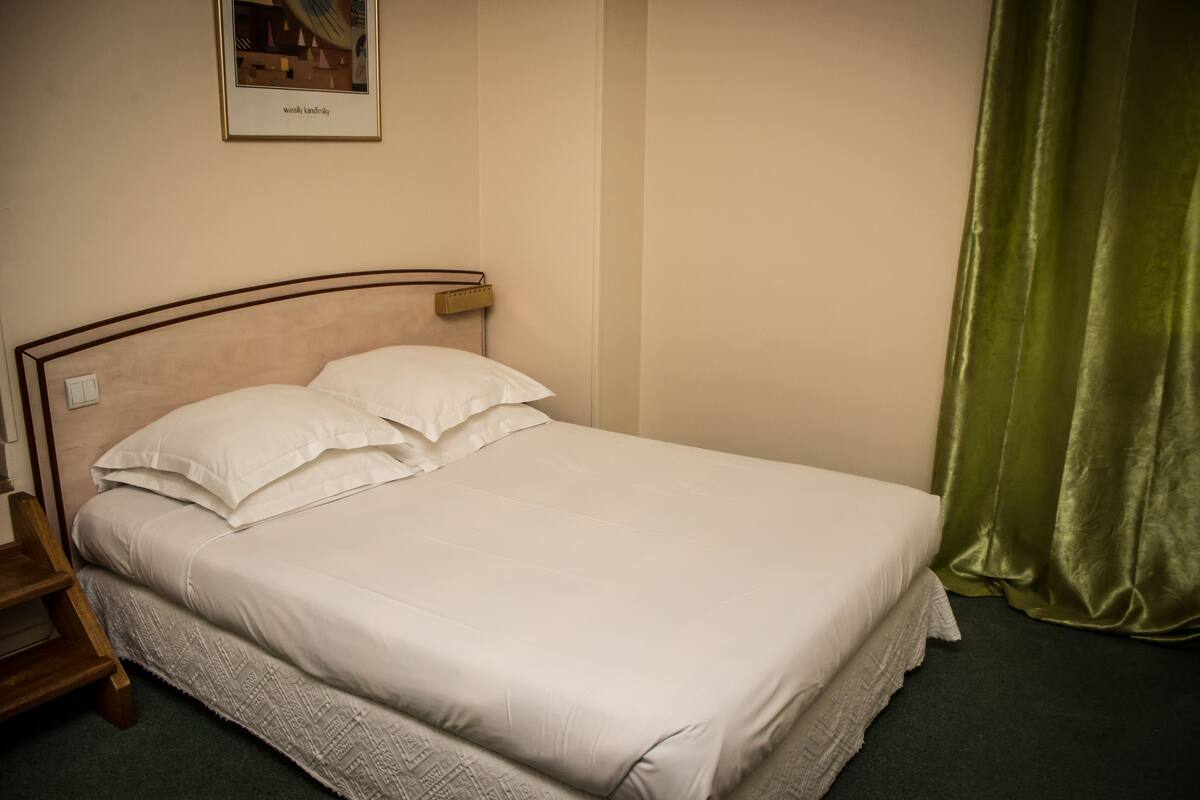 Triple Room | Down comforters, desk, blackout drapes, iron/ironing board (on request)