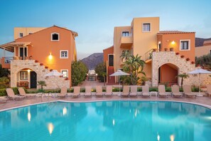 Seasonal outdoor pool, pool umbrellas, pool loungers