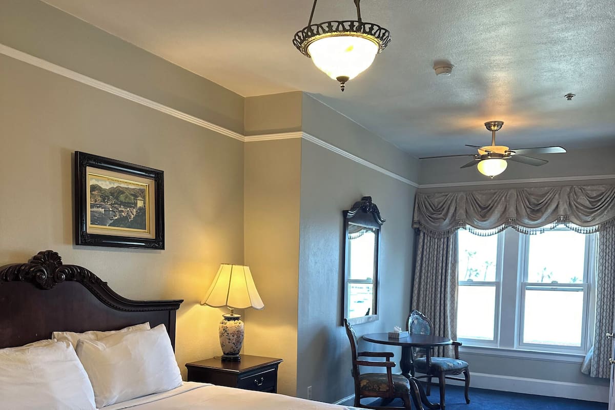 Premium Room, 1 King Bed, Partial Ocean View (1 King- Ocean View) | 1 bedroom, iron/ironing board, free WiFi, bed sheets