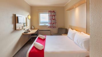 Desk, laptop workspace, free WiFi, bed sheets
