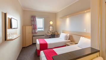 Desk, laptop workspace, free WiFi, bed sheets