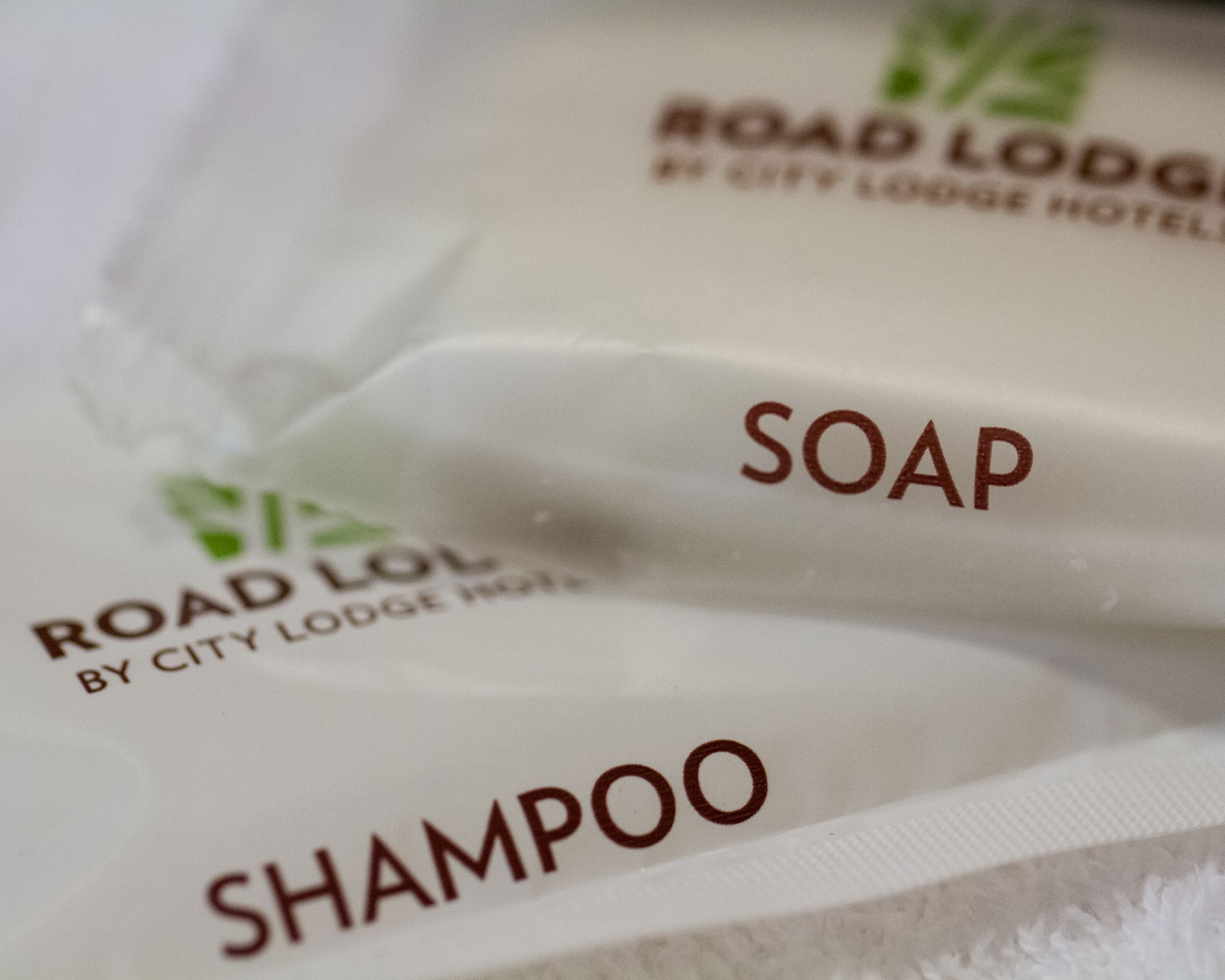 A close-up of a product label with the text "SOAP" and "SHAMPOO" visible.