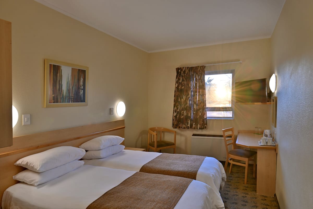 Desk, blackout drapes, iron/ironing board, free WiFi