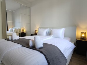 Executive appartement, 1 slaapkamer, balkon | 1 slaapkamer, een kluis op de kamer, individueel gedecoreerd