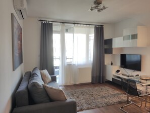 Appartement exécutif, 1 chambre, balcon | Coffre-fort, décor unique, ameublement unique, rideaux d’obscurcissement