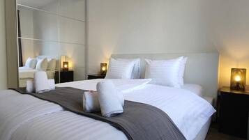 Apartment, 1 Bedroom | In-room safe, blackout curtains, soundproofing, iron/ironing board