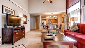 Suite, 2 Bedrooms | Living area | 42-inch flat-screen TV with cable channels, TV, table football