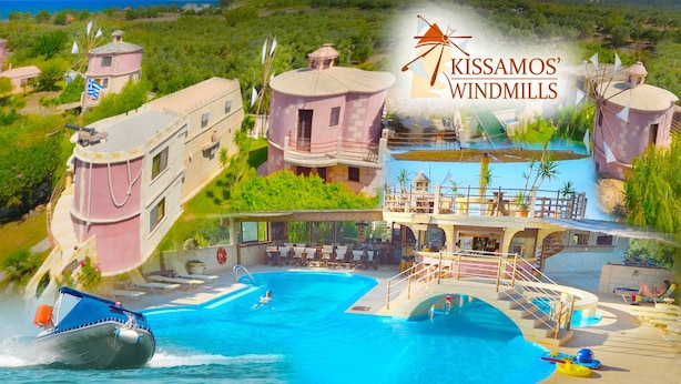 A resort with a swimming pool, windmills, and a boat. - Anemomili Village (Kissamos)