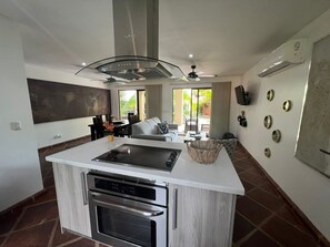 Exclusive Apartment, 2 Bedrooms, Kitchen, Ocean View | Private kitchen | Fridge, microwave, oven, stovetop - Tropical Gardens (Sardinal)
