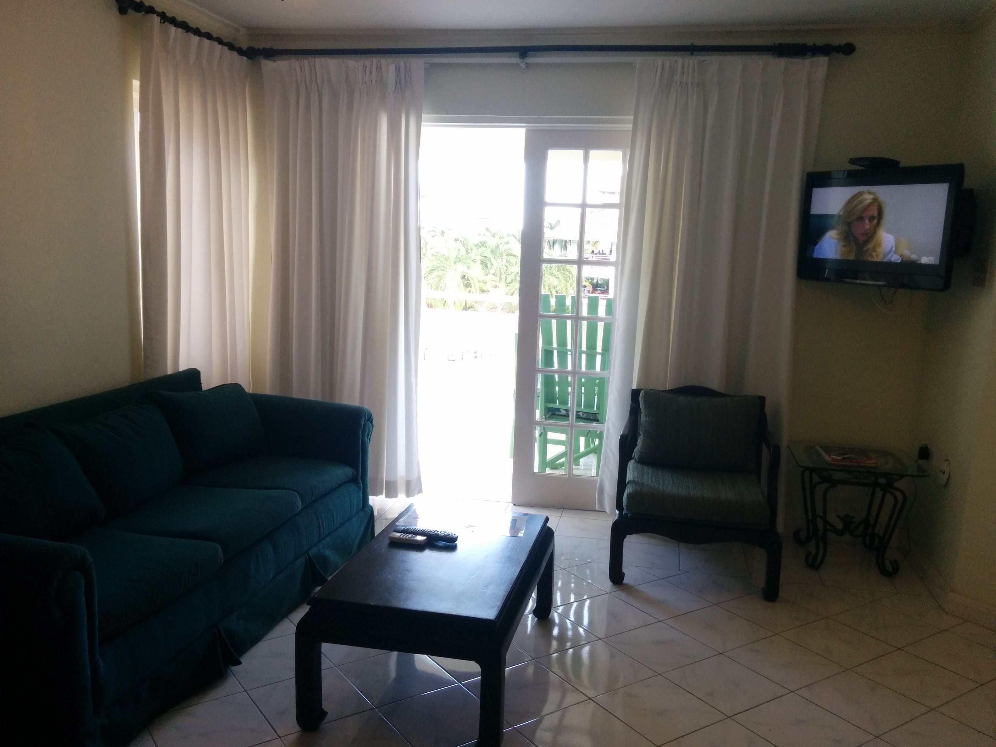 Premier Suite, 1 Bedroom, Refrigerator & Microwave, Resort View | Living area | LCD TV