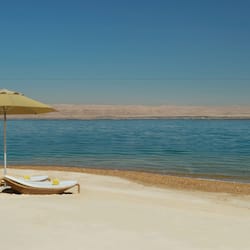On the beach, free beach cabanas, beach umbrellas, beach towels