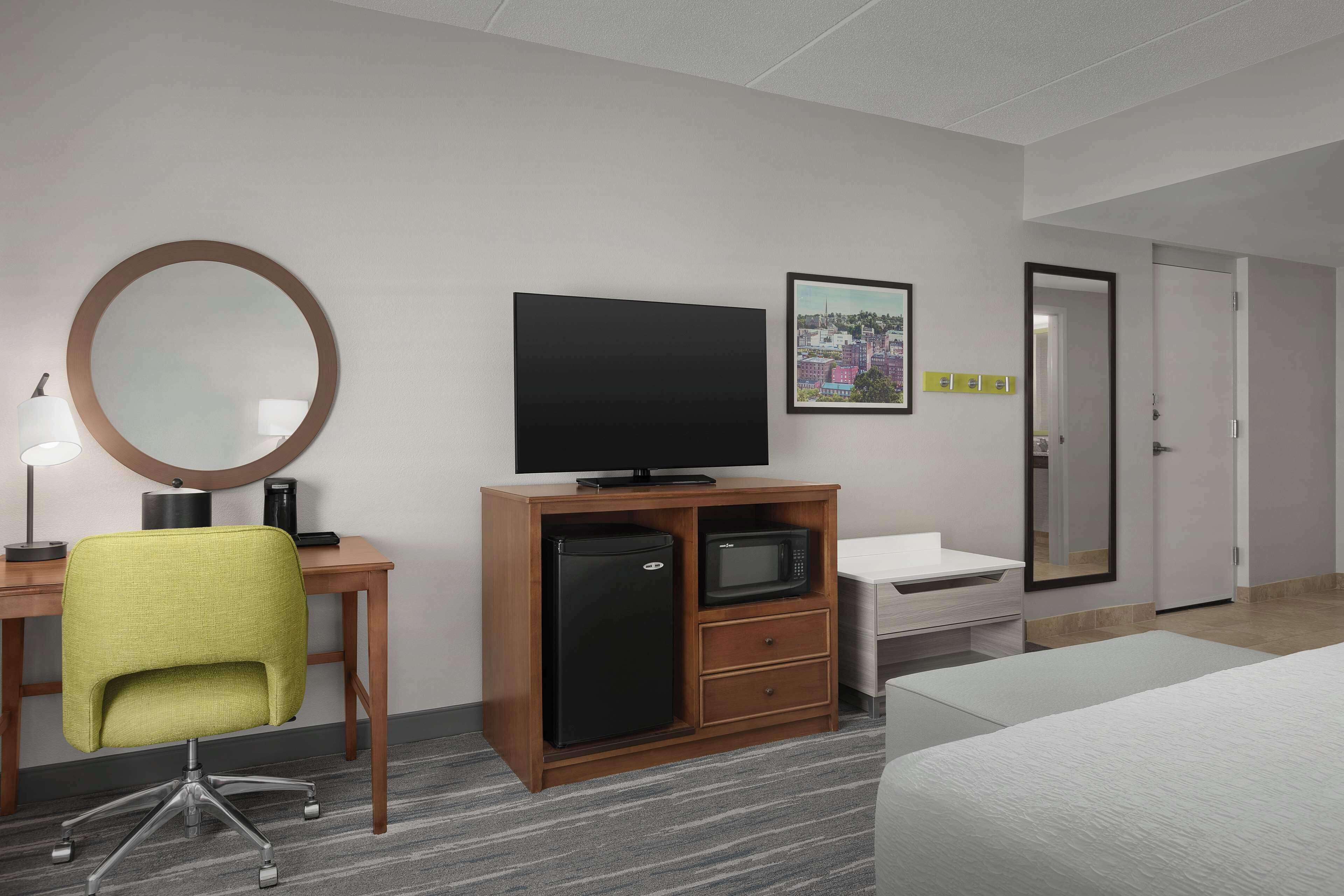 premium bedding, desk, laptop workspace, blackout curtains