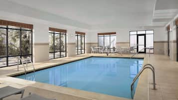 Indoor pool, open 8:00 AM to 10:00 PM, pool loungers