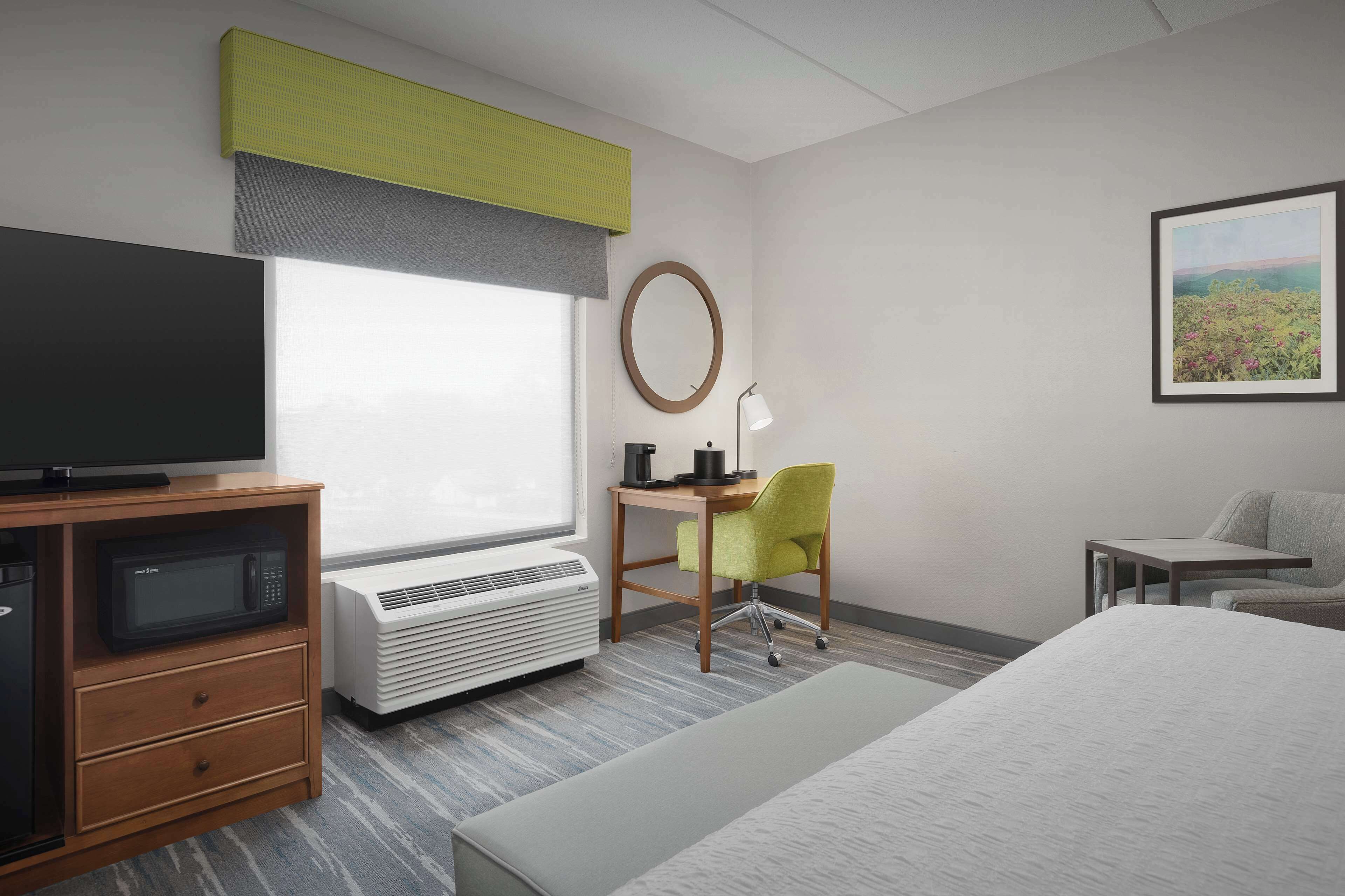 premium bedding, desk, laptop workspace, blackout curtains